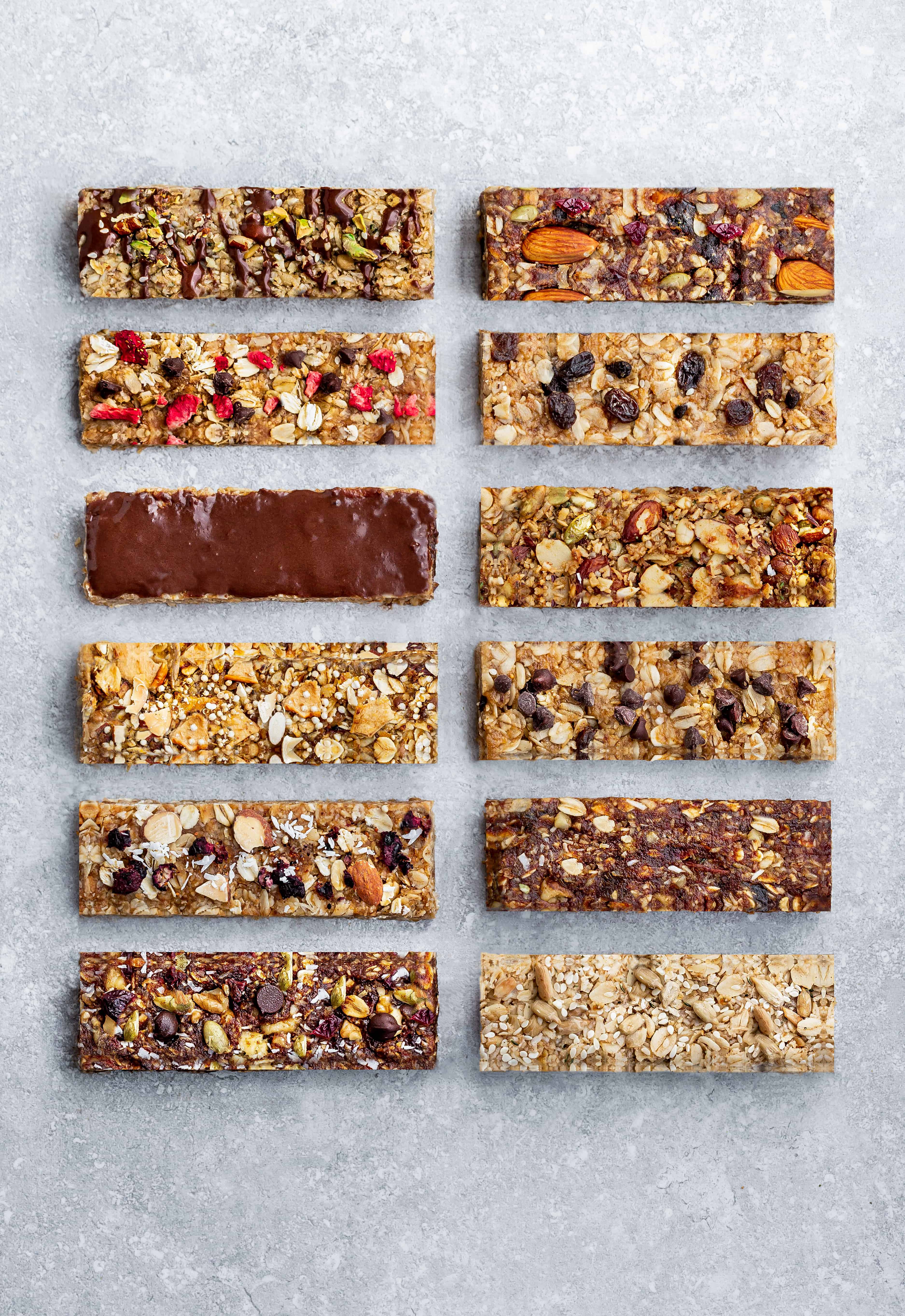 Homemade Granola Bars - 12 Ways - Switch up your snack lineup with these healthy on-the go snacks. Best of all, these protein bars are simple to customize and make ahead for school or work lunchboxes. Refined sugar free, gluten free, nut free and keto options.