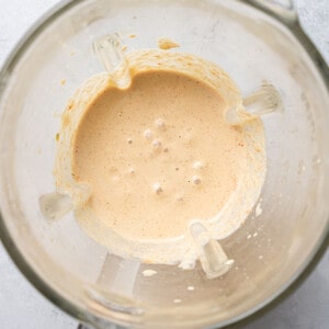Top view of blended mayo in a food processor