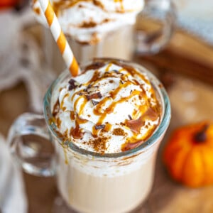 Top view of Copycat Starbucks Pumpkin Latte in a two coffee glasses with straws