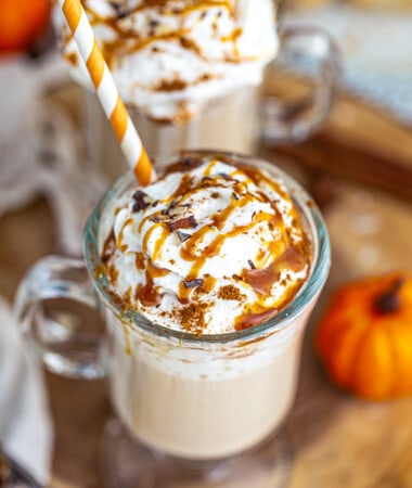 Top view of Copycat Starbucks Pumpkin Latte in a two coffee glasses with straws