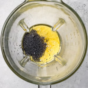 Top view of ingredients to make keto poppy seed dressing in a blender