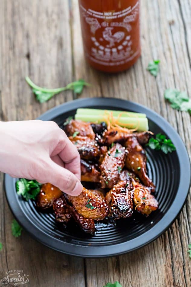 Honey Lime Sriracha Chicken Wings makes the perfect appetizers for game day. Best of all, they're so easy to make with a flavorful and delicious Asian inspired sticky sauce.
