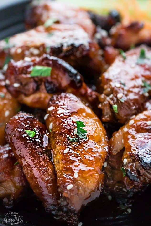 Honey Lime Sriracha Chicken Wings makes the perfect appetizers for game day. Best of all, they're so easy to make with a flavorful and delicious Asian inspired sticky sauce.