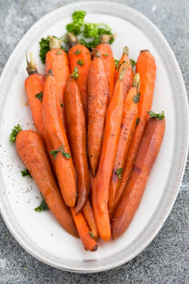 Top view of Honey Roasted Carrots on a platter garnished with parsley