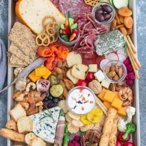 How to Make the Ultimate Charcuterie and Cheese Boards - 6 ways – perfect easy party appetizer tray to make in less than 20 minutes. Everything you need to know to easily build the best charcuterie board plus awesome tips & tricks including 2 low carb / keto boards. Customize using simple pantry ingredients. Recipes include: cured meats, smoked salmon, grilled shrimp, breadsticks, crackers, blue cheese, cheddar, brie, goat cheese, dried fruit, olives, almonds, pecans