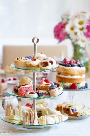 Foods for a tea party displayed on a table