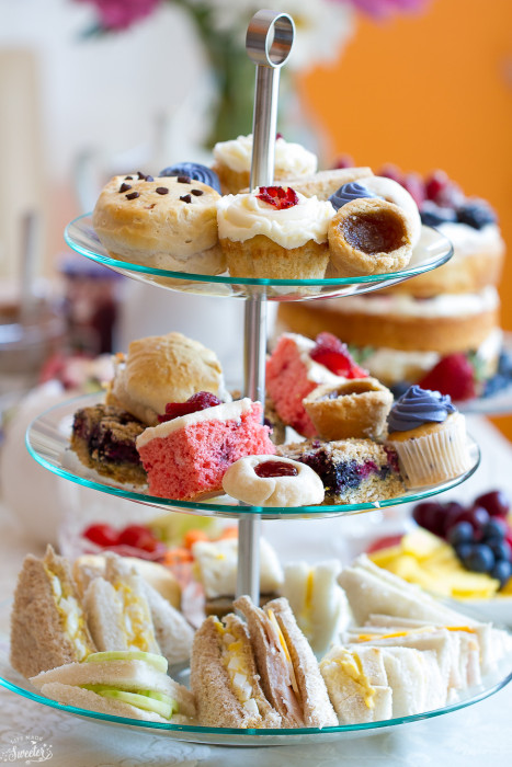 3-tiered stand with tea sandwiches and treats
