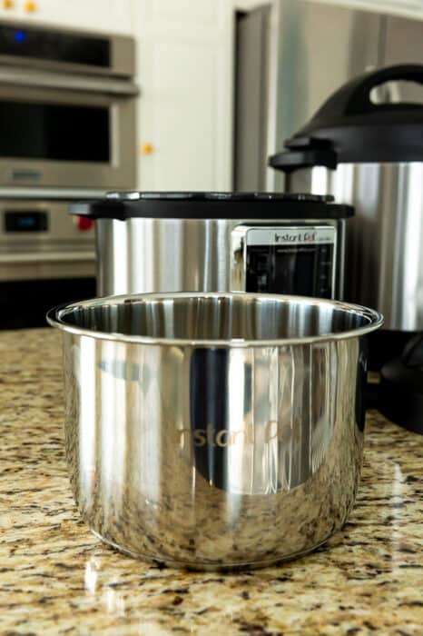 Side view of stainless steel Instant Pot pressure cooker pot