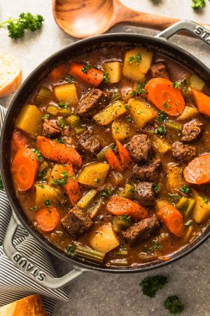 This recipe for Classic Homemade Beef Stew makes the perfect comforting dish on a cold day. Best of all, it's easy to make and has the most delicious tender meat with carrots, potatoes, sweet potatoes and celery. So good for warming up on a cold day and reminds you of mom's home cooking!