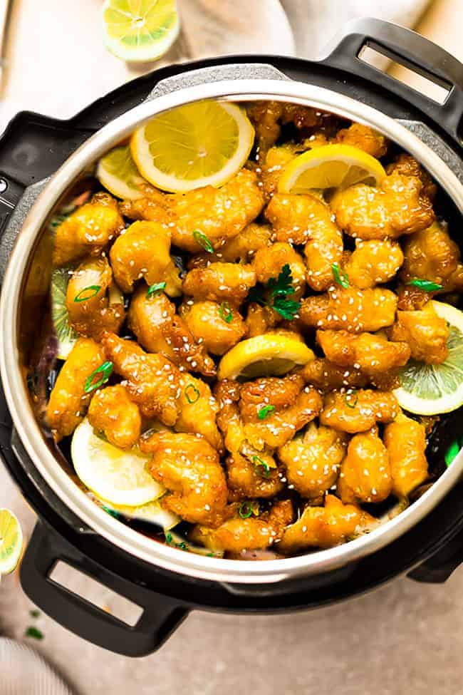 Top view of Asian Lemon Chicken in an instant pot with lemon slices