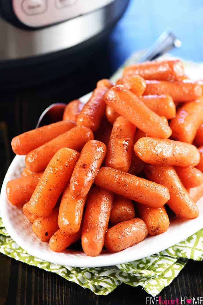 Honey Cinnamon roasted baby carrots in a serving bowl