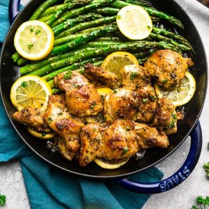 Instant Pot Lemon Garlic Chicken - the perfect low carb & keto friendly meal for spring. Best of all, this recipe is super simple and the chicken cooks up tender, juicy and full of flavor with instructions for the pressure cooker and stovetop. Serve with roasted asparagus, broccoli, zucchini, green beans, cauliflower or your favorite vegetable. Great for meal prep Sunday to make ahead for work or school lunchboxes & lunchbowls