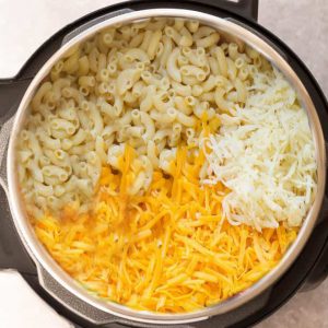 Top view of ingredients in the Instant Pot to make Macaroni and cheese