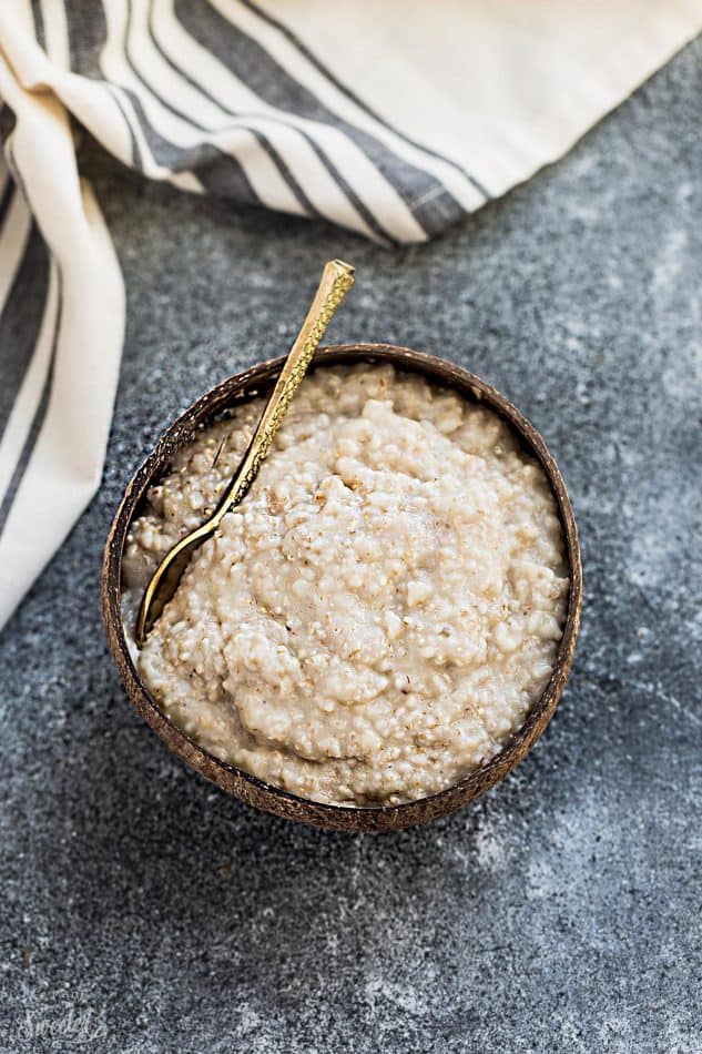 Instant Pot Oatmeal in a Bowl with a Small Golden Spoon Inside