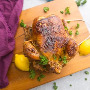 Instant Pot Whole Rotisserie Chicken - perfectly tender, juicy, roasted chicken you can make easily at home using your Instant Pot pressure cooker. Best part of all, you can have a simple chicken dinner in under 45 minutes. Plus instructions for cooking the chicken in the oven, thawed and frozen. No more dry chicken breasts - so juicy and moist & great for Sunday meal prep. Use your leftovers for soups, pastas, casseroles, tacos, bone & chicken broth and more!