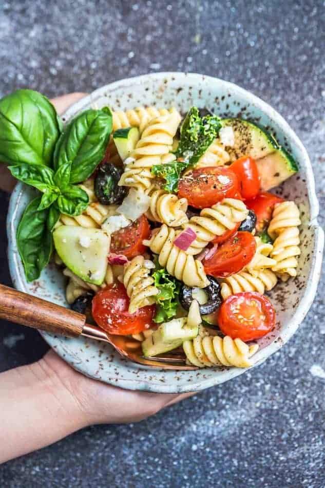 Italian pasta salad with basil and tomatoes for Memorial Day.