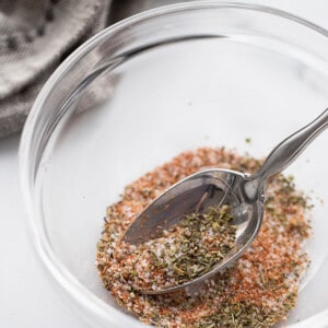 Close-up view of chicken seasoning mix in a clear bowl