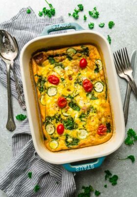 Top view of low carb breakfast egg casserole in a blue casserole pan