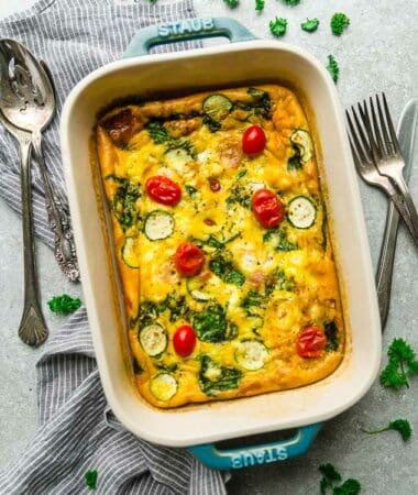 Top view of low carb breakfast egg casserole in a blue casserole pan