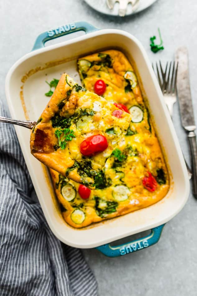 Top view of low carb breakfast egg casserole in a blue casserole pan