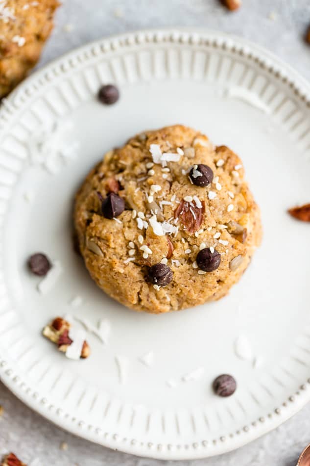 Keto Breakfast Cookies are soft, chewy and make the perfect healthy breakfast for on the go. Best of all, this delicious sugar free recie comes together in one bowl with almond flour, coconut flakes, sesame seeds and chopped nuts.
