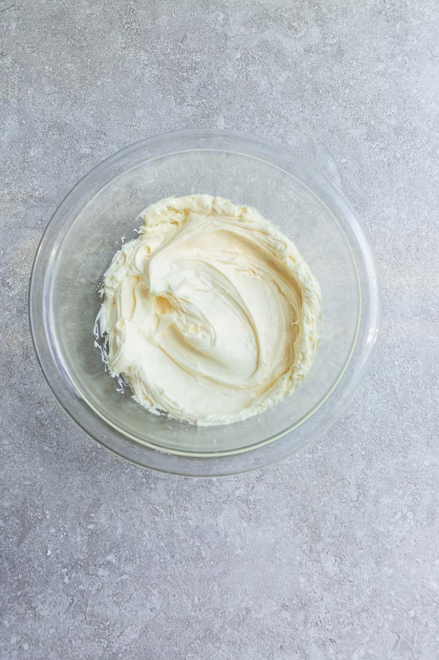 Top view of cream cheese frosting for low carb carrot cake in a bowl