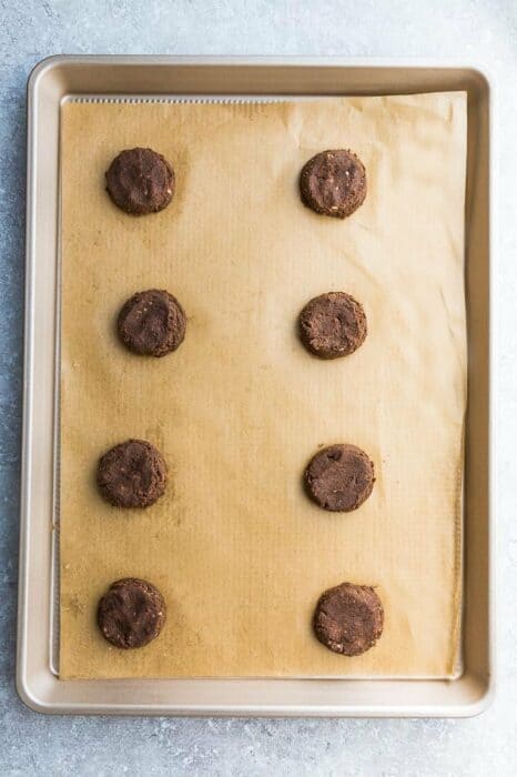 Top view of chocolate cookie dough on a baking sheet