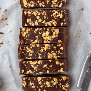 Top view of easy chocolate fudge strips on a parchment paper