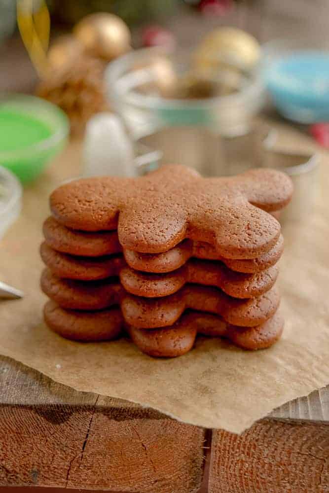 A stack of undecorated gingerbread man cookies
