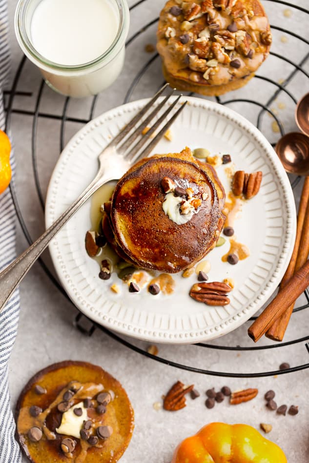 Ketoi Pumpkin Pancakes – soft, thick, fluffy and perfect for any fall breakfast, Thanksgiving morning or weekend brunch. Best of all, they're low carb, gluten free and paleo friendly.
