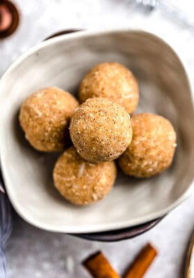 Top view of keto peanut butter protein balls without oats in a white bowl