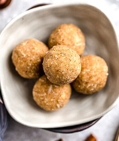 Top view of keto peanut butter protein balls without oats in a white bowl