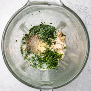 Top view of ingredients to make keto ranch dressing in a blender