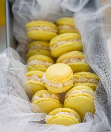 Lemon French Macarons filled with coconut buttercream make the perfect sunny sweet treat!!