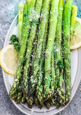Lemon Parmesan Roasted Asparagus is the perfect quick and easy side dish for holidays or any night of the week. Best of all, this recipe only requires 5 minutes of prep with fresh lemon juice, garlic and Parmesan.
