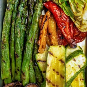 Pinterest graphic of grilled vegetables on silver tray.