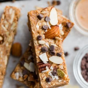 Close up top view of keto granola bars on a grey background