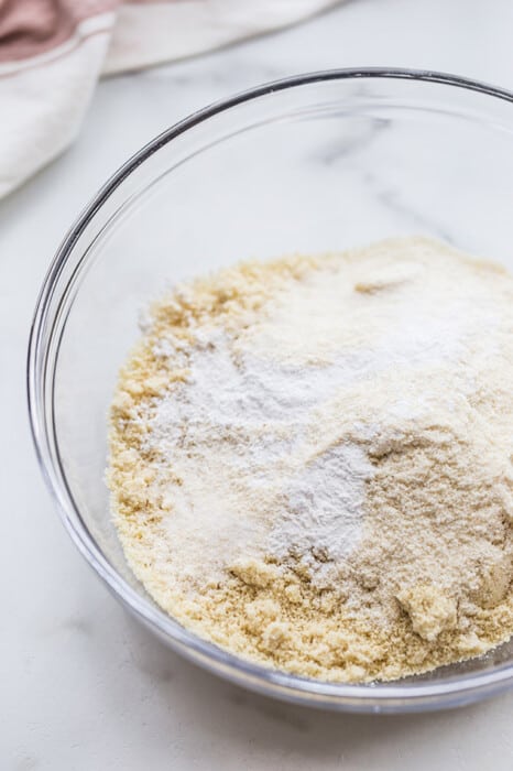 Dry ingredients for Keto Vanilla Cake in a glass bowl