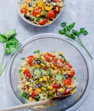 Top view of Mexican Quinoa Salad in a mixing bowl and in a smaller bowl