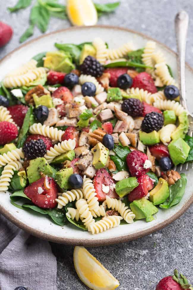 Berry Spinach Pasta Salad is fresh flavorful and perfect for summer potlucks and barbecues. Best of all, packed with healthy spinach, fresh strawberries, blackberries, blueberries, raspberries, rotini pasta tossed in a balsamic vinaigrette. Serve with or without grilled chicken.