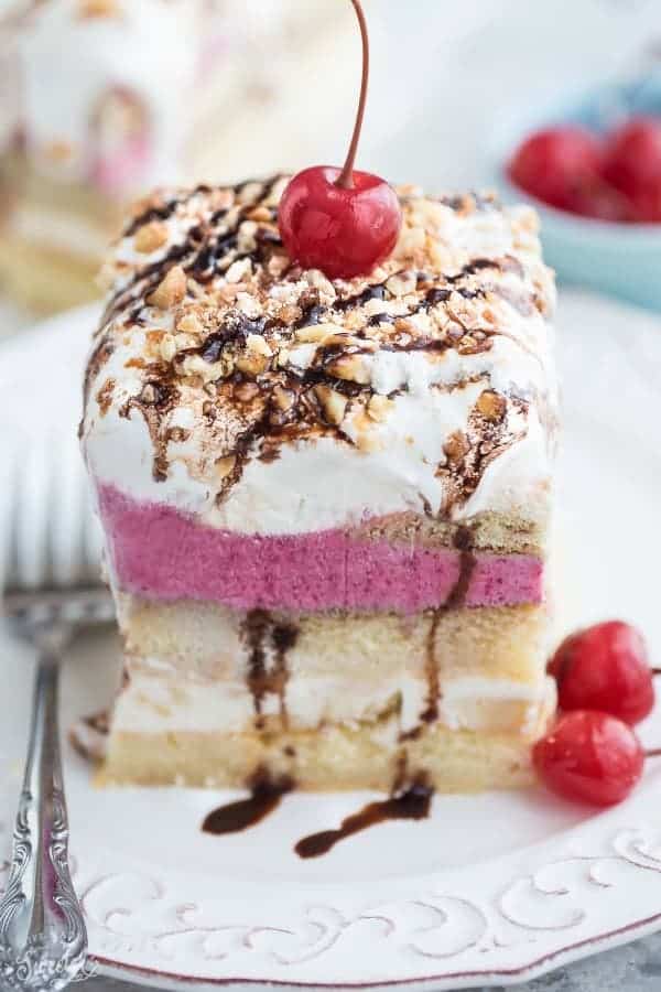 Close-up of a square of No Bake Banana Split Tiramisu on a white plate