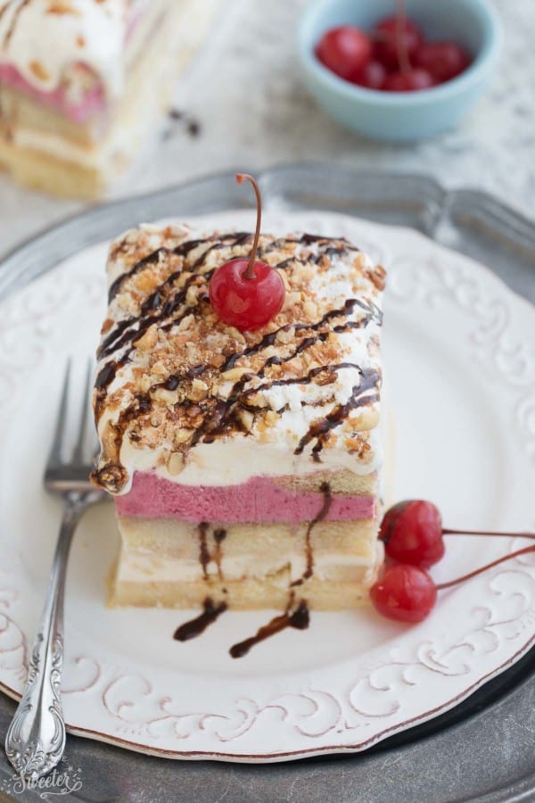 A square of No Bake Banana Split Tiramisu on a white plate with a fork