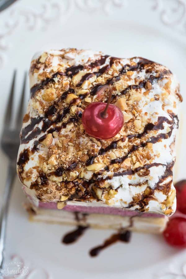 Overhead view of a square of No Bake Banana Split Tiramisu on a white plate