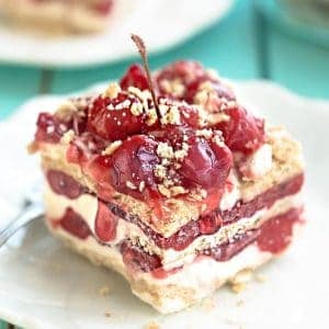 Close-up of a square of No Bake Cherry Cheesecake Icebox Cake on a plate