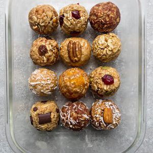No Bake Energy Bites 12 Different Ways - the perfect easy and healthy no bake & tasty gluten free snacks for on the go or after a workout! Best of all, most of these delicious recipes have no refined sugar and are simple to customize & make ahead for meal prep to pack for school or work lunchboxes. Flavors include: 5 Ingredient, Almond Joy, Apple Cinnamon, Apricot, Banana, Carrot Cake, Coconut Almond Butter, Cranberry, Lemon, Mocha, Oatmeal Raisin, Pumpkin & Turtle Pecan
