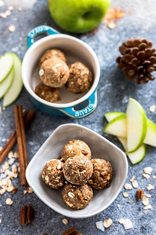 Apple Energy Bites - the perfect easy and healthy no bake snacks for on the go or after a workout! Best of all, no refined sugar and super easy to customize and make ahead for packing into school or work lunchboxes. Full of cozy fall and apple flavors with gluten free and nut free options.