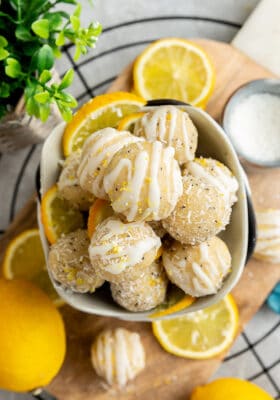 Top view of a pile of No Bake Vegan Lemon Protein Balls stacked in a white bowl
