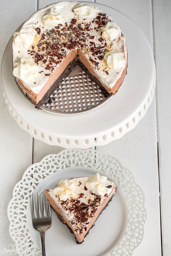 Overhead view of No Bake Nutella Cheesecake Pie with a slice on a plate