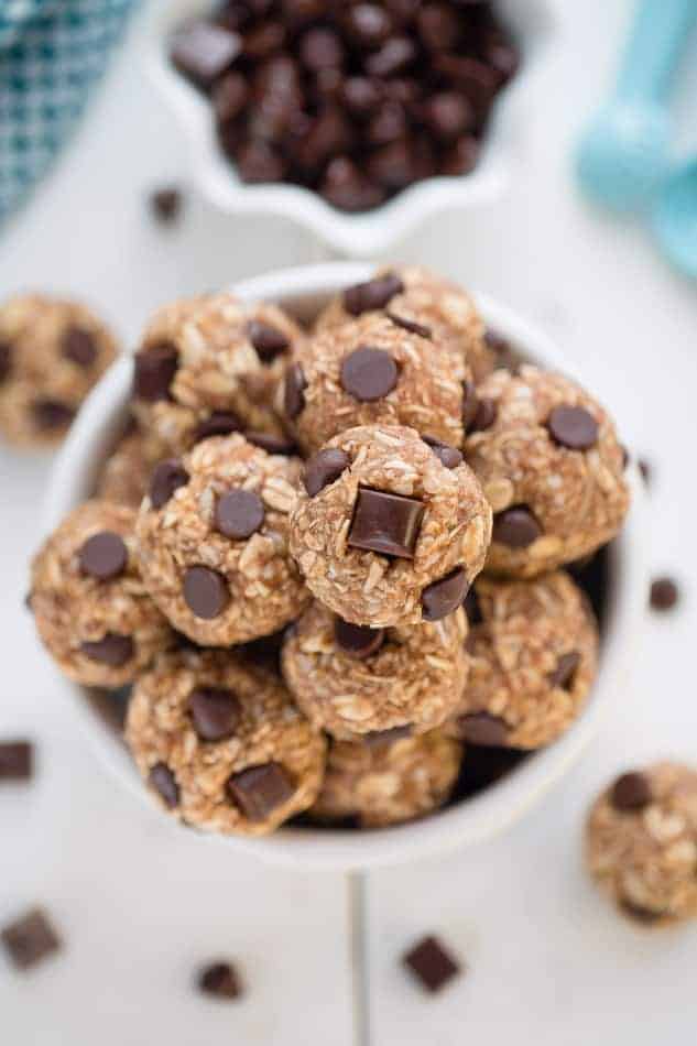 No Bake Energy Bites with chocolate chips in a small white bowl.