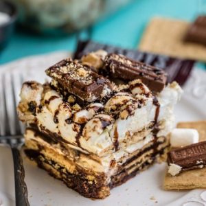 A square of No Bake S'mores Icebox Cake on a plate with a fork